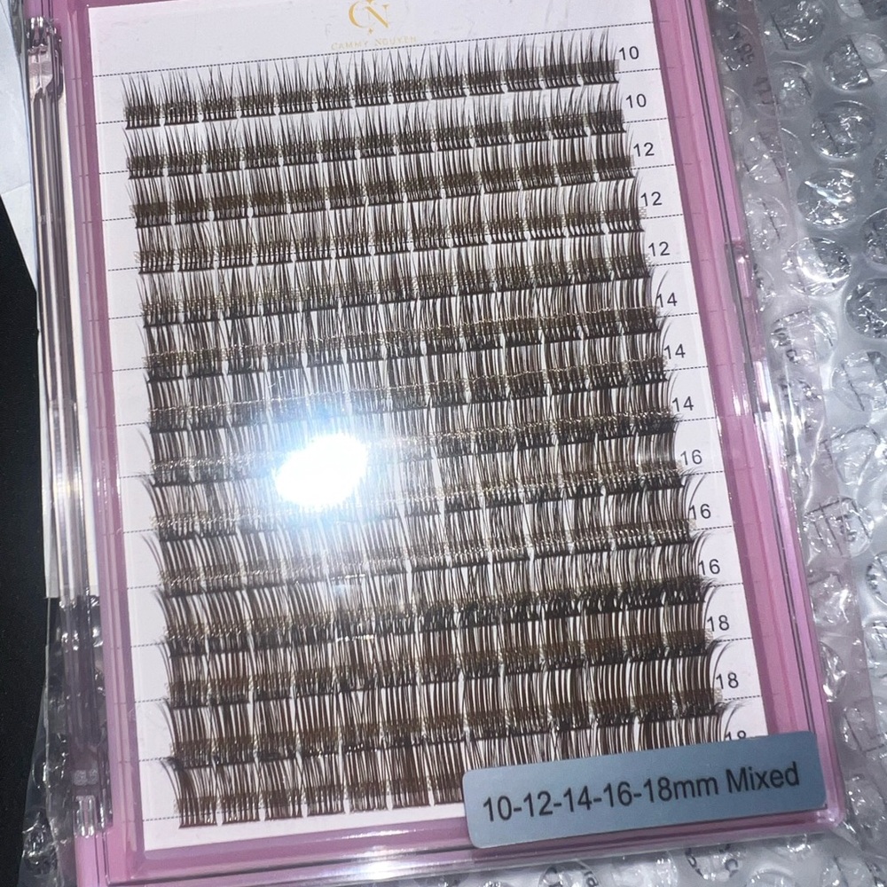Mixed Length Eyelash Extensions Brown Clusters.